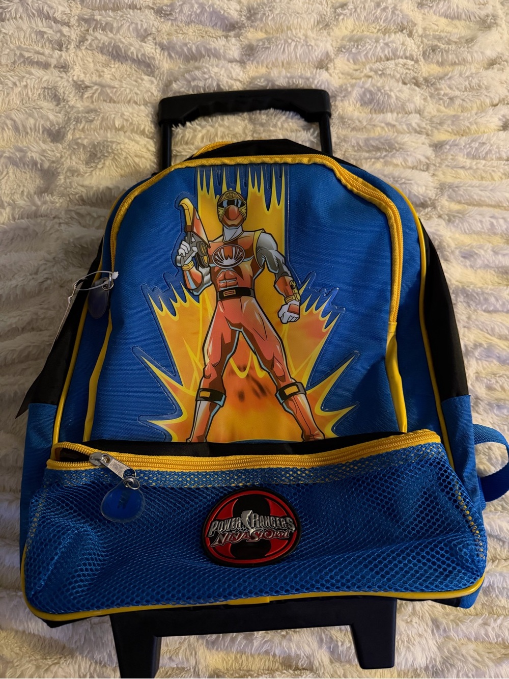 Power Ranger Blue and Yellow Rolling Backpack with power Ranger Graphic